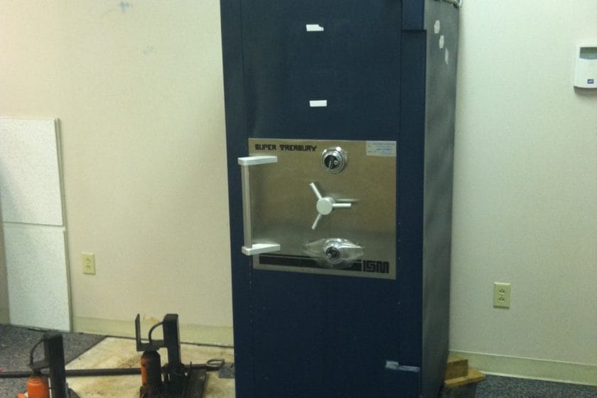 Super Treasury TL-30X6 bank safe on blocks and ready to roll a pallet jack under to move it out of a bank that closed