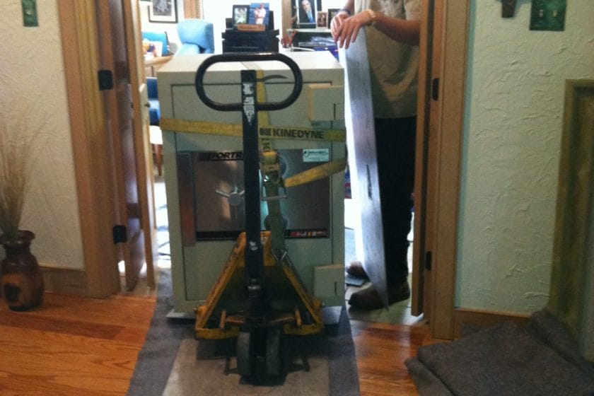 Fortress TL-30 on a pallet jack being moved across blankets and aluminum plated through a house