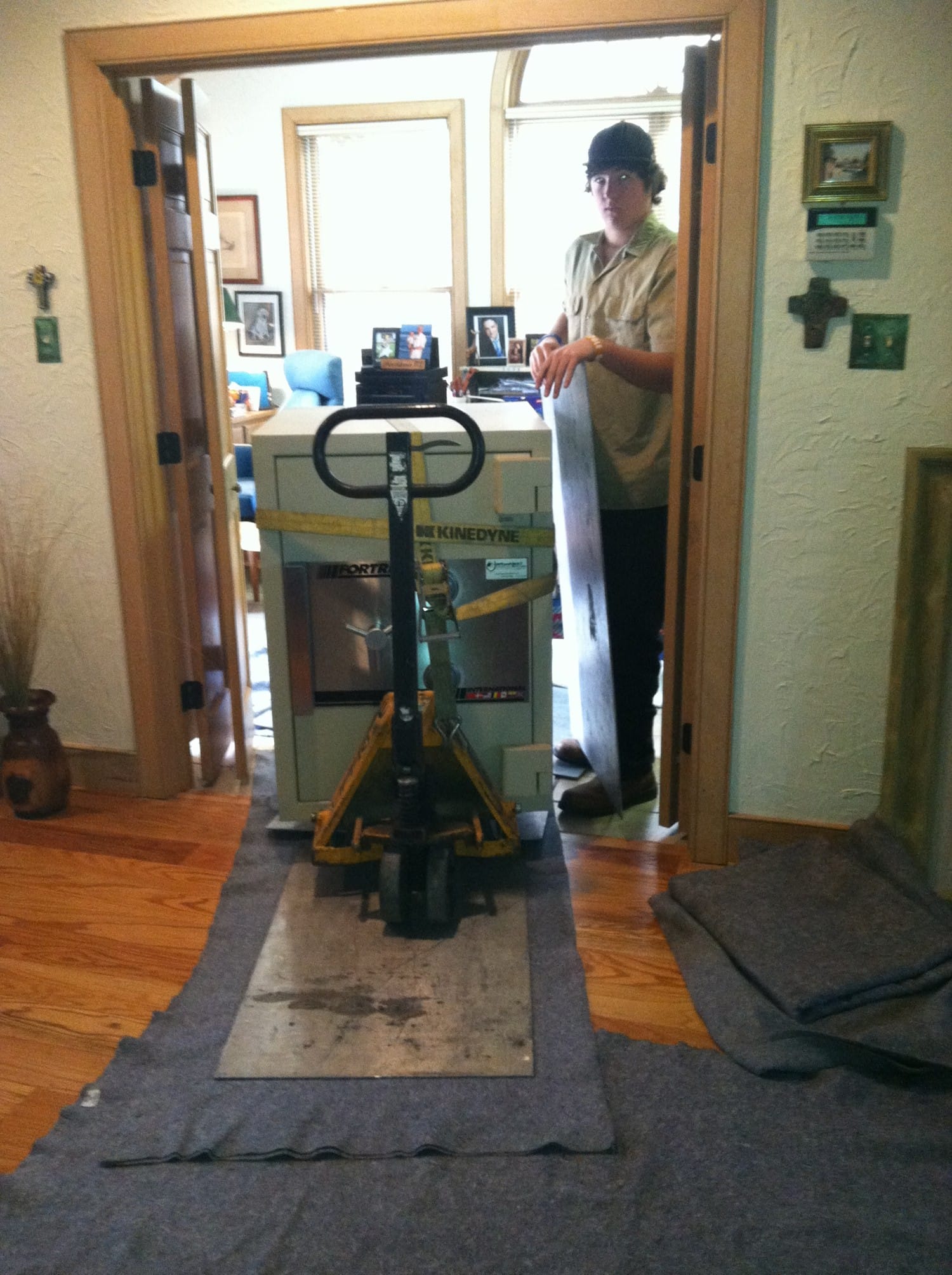 Fortress TL-30 on a pallet jack being moved across blankets and aluminum plated through a house