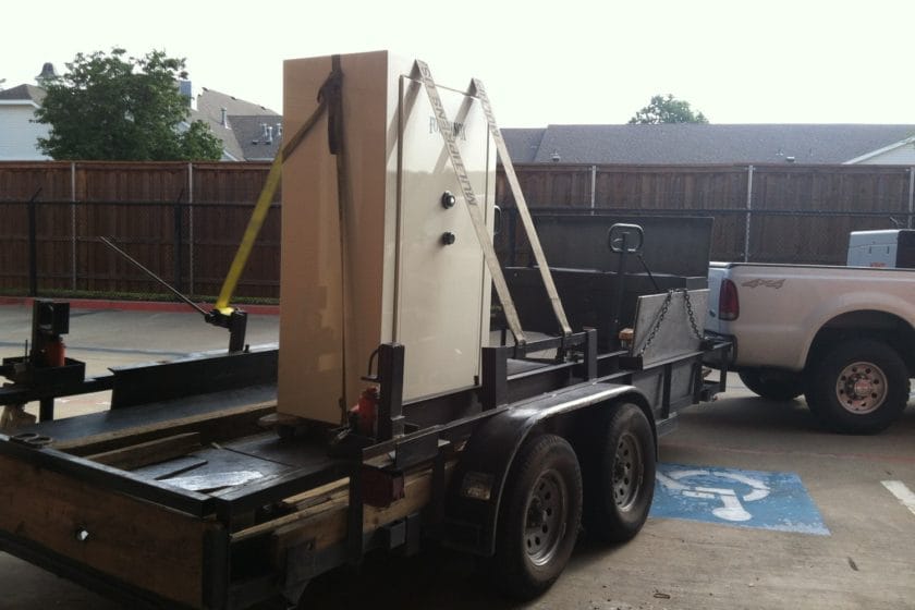 Fort Knox gun safe strapped to our safe moving trailer attached to our truck