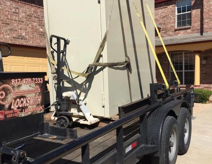 tornado shelter loaded on our safe moving trailer and strapped down in front of home