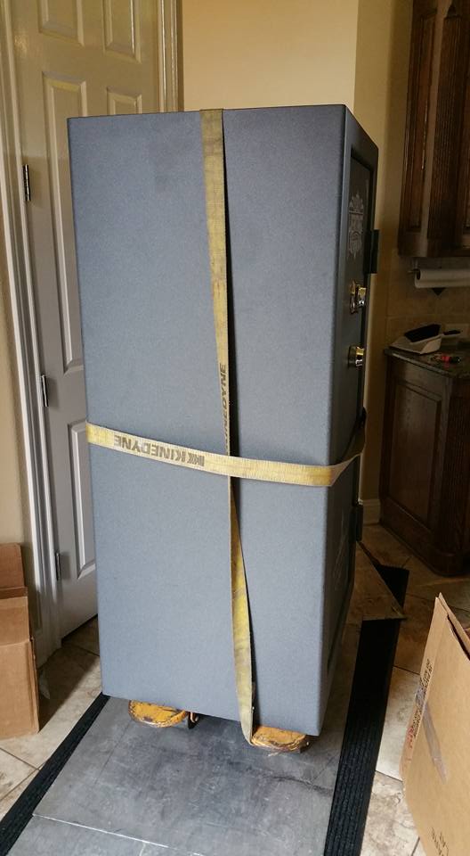 Moving a Heritage gun safe from a home in Grand Prairie, TX into a home in Colleyville, TX, and placing it inside of a closet.