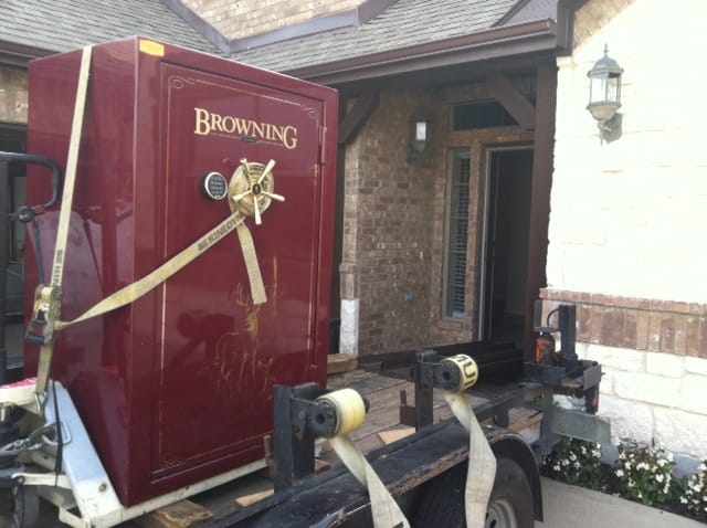 Browning gun safe ready to be unloaded from the safe moving trailer through the front door of the home