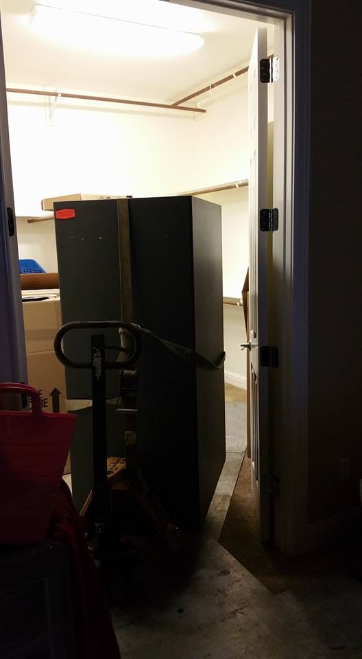 Moving a Heritage gun safe from a home in Grand Prairie, TX into a home in Colleyville, TX, and placing it inside of a closet.